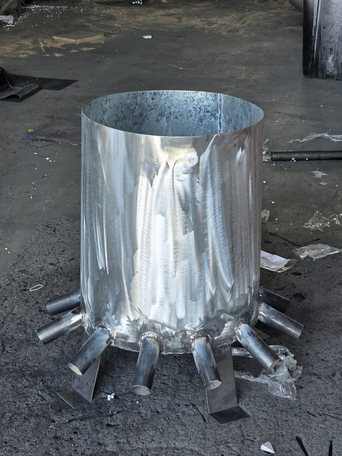 A slurry distributor head, rolled and welded with its outlet spigots, before finishing