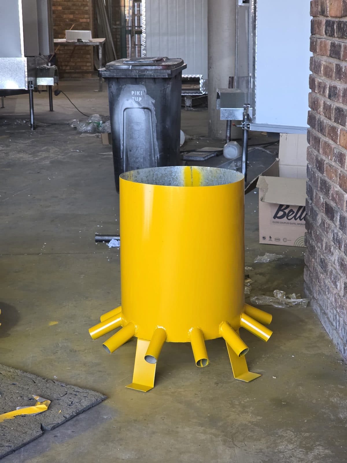 The same slurry distributor head finished and painted, ready for installation