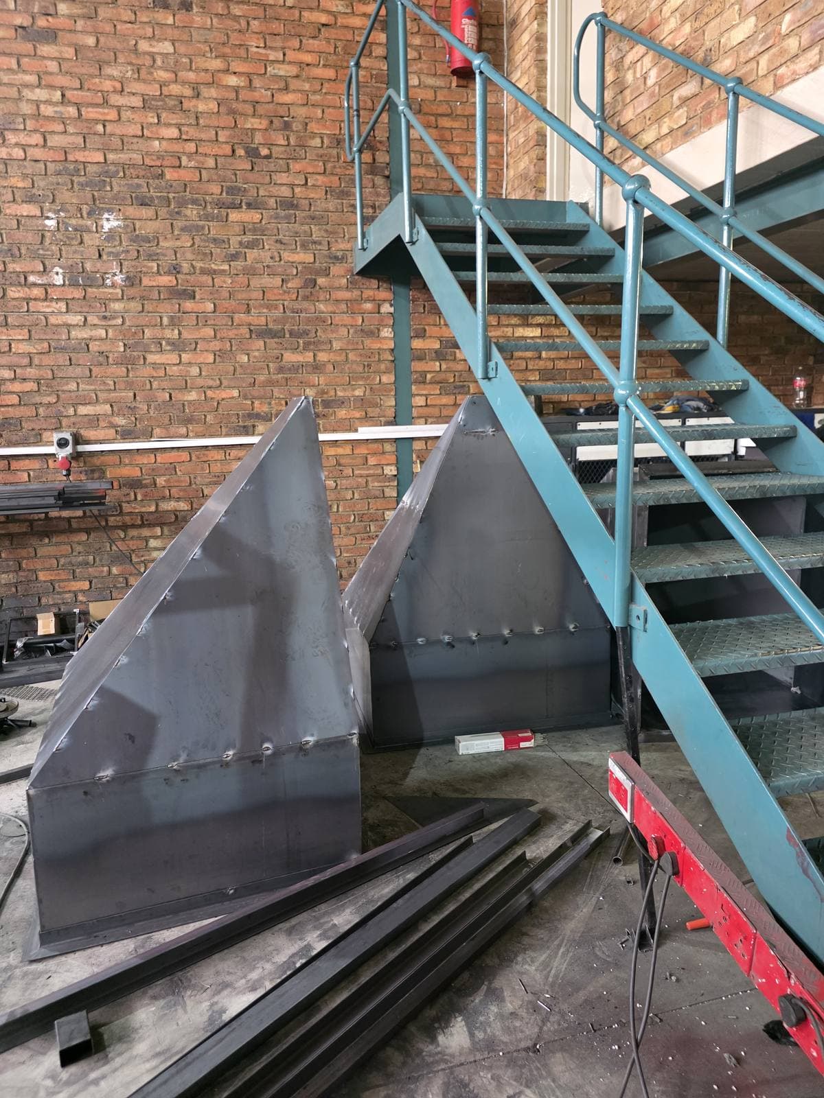 Fabricated wash bins and a galvanised access staircase in the Trailored workshop