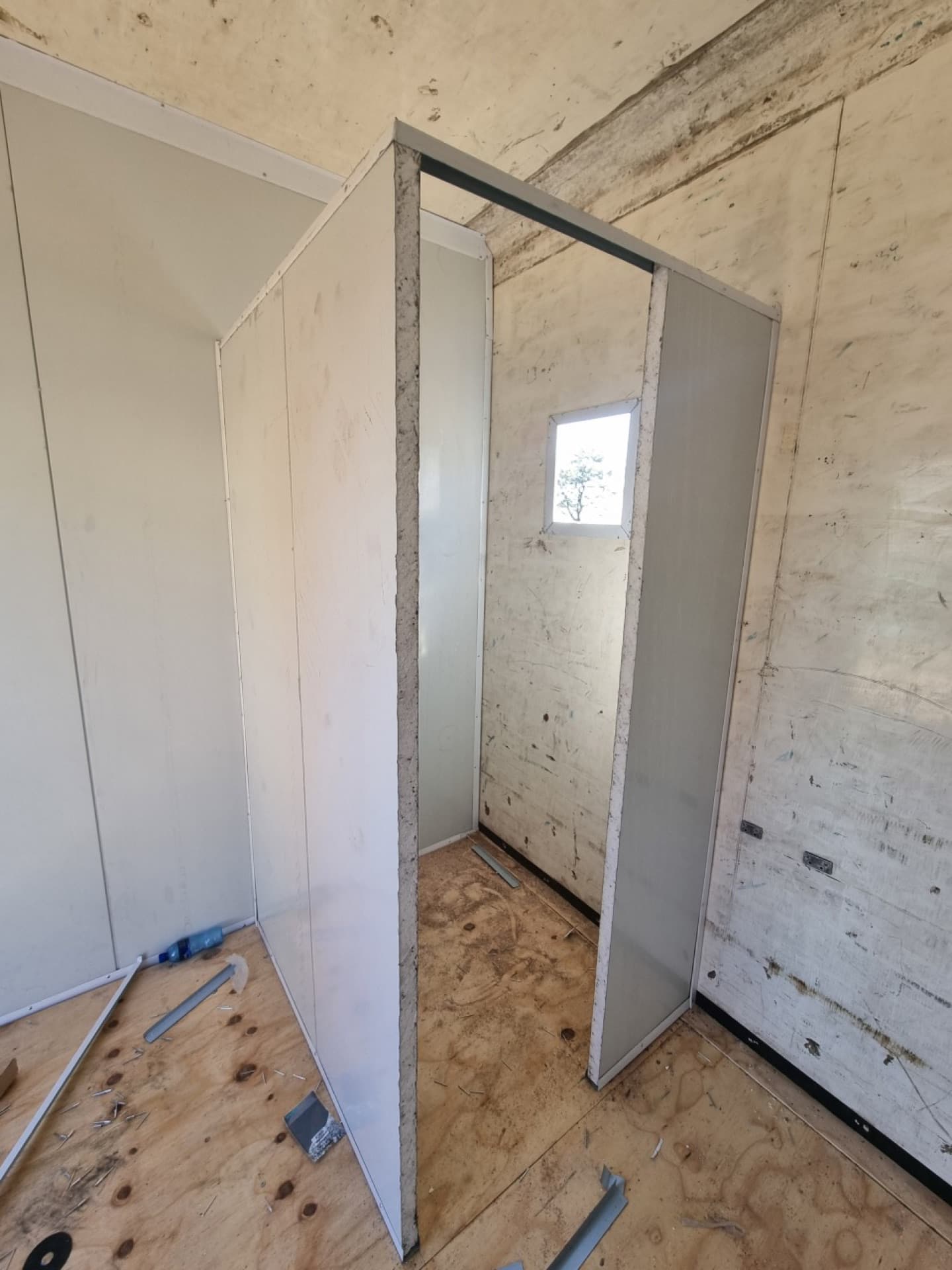 A roof vent and skylight framed into the trailer ceiling during the build