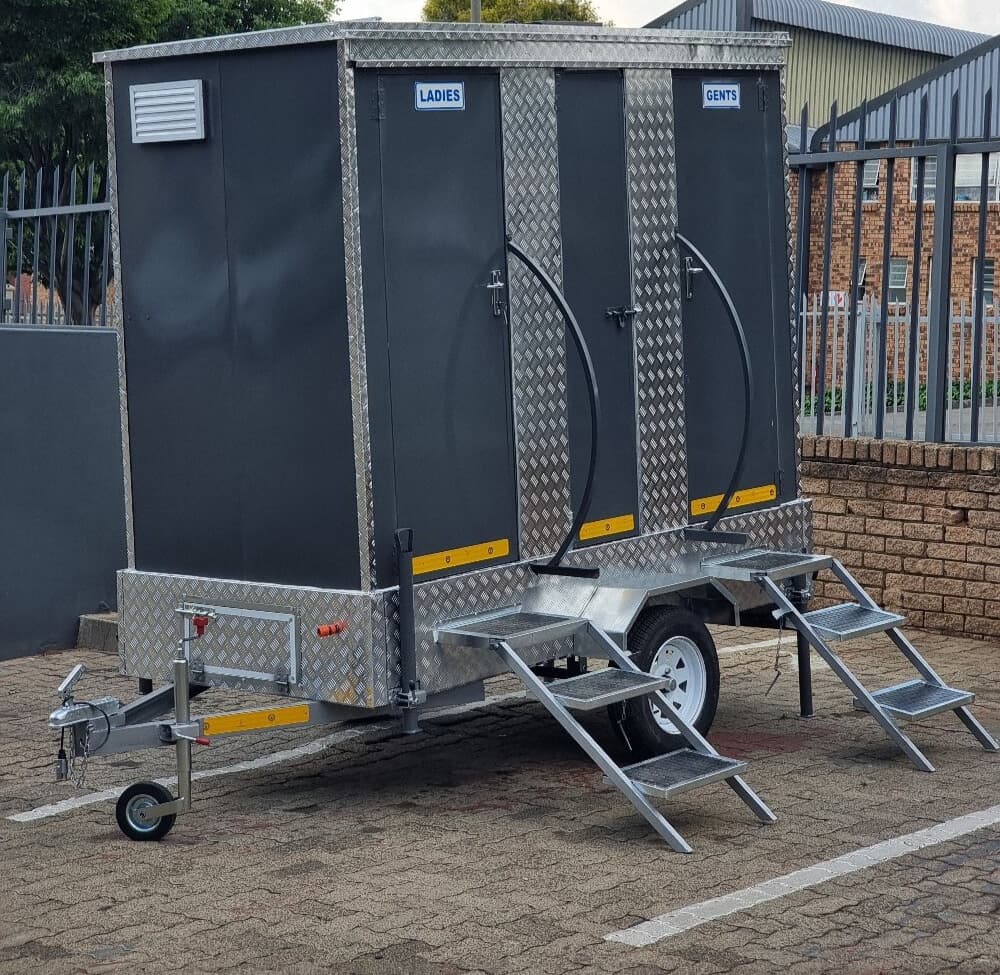 VIP toilet trailer with dual entrances