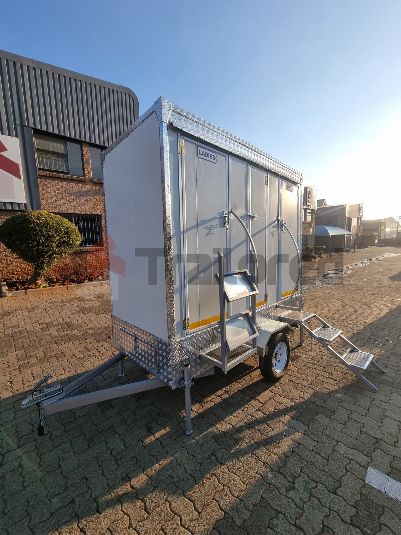 Premium two-stall VIP toilet trailer, exterior view