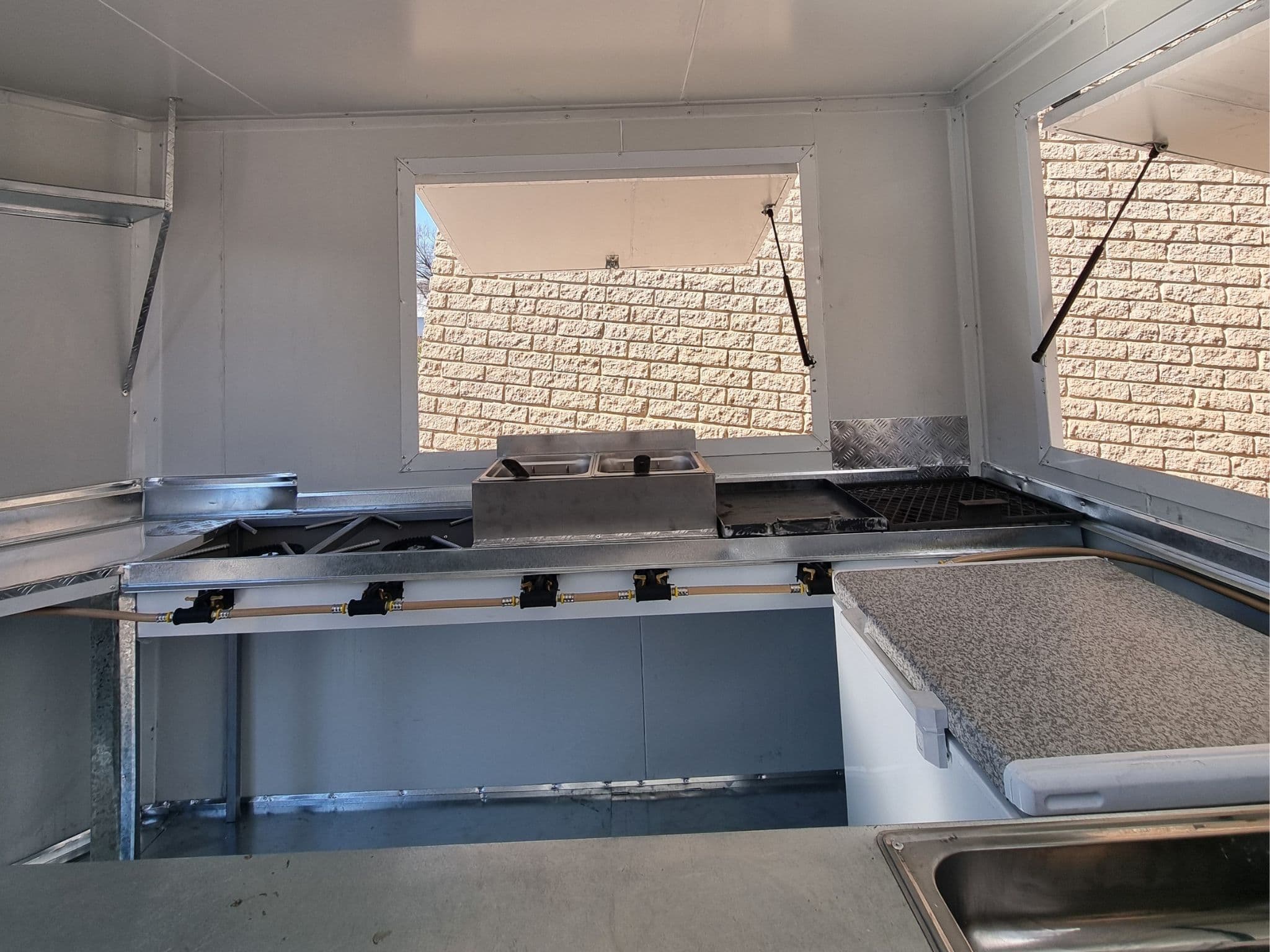 Chingali trailer serving hatch