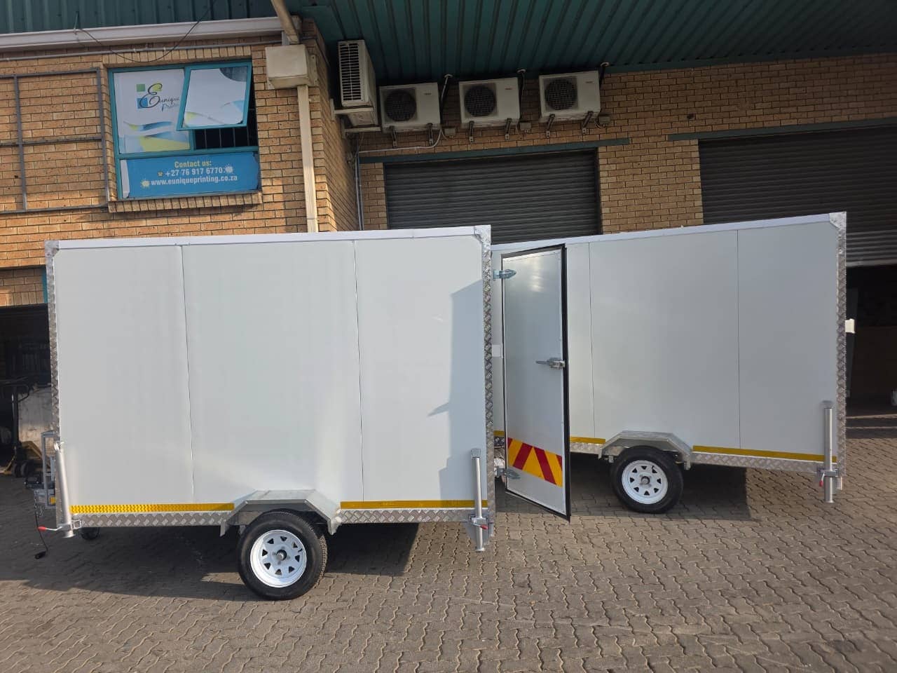 3m fridge trailer side profile with the access door open